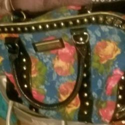 Large Betsey Johnson floral duffel bag.