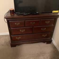 Brown dresser and night stand