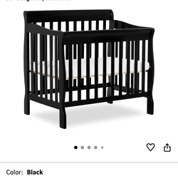 Mini crib with two 3 in mattresses