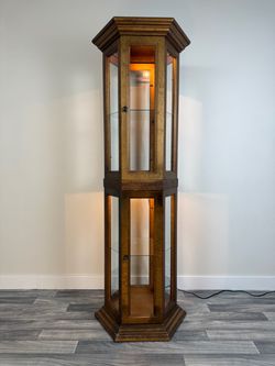Good lighted curio cabinet- display case
