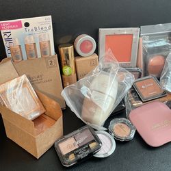 Unopened Bronzers ,Eye Showdow, and Foundation Lot