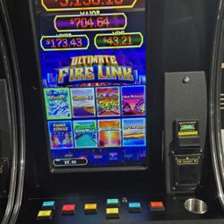 ARCADE MACHINE WITH FIRELINK 8 IN 1 GAME BOARD.