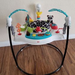 Practically New Fisher Price Baby Jumper With Music And Lights ( Used Once).