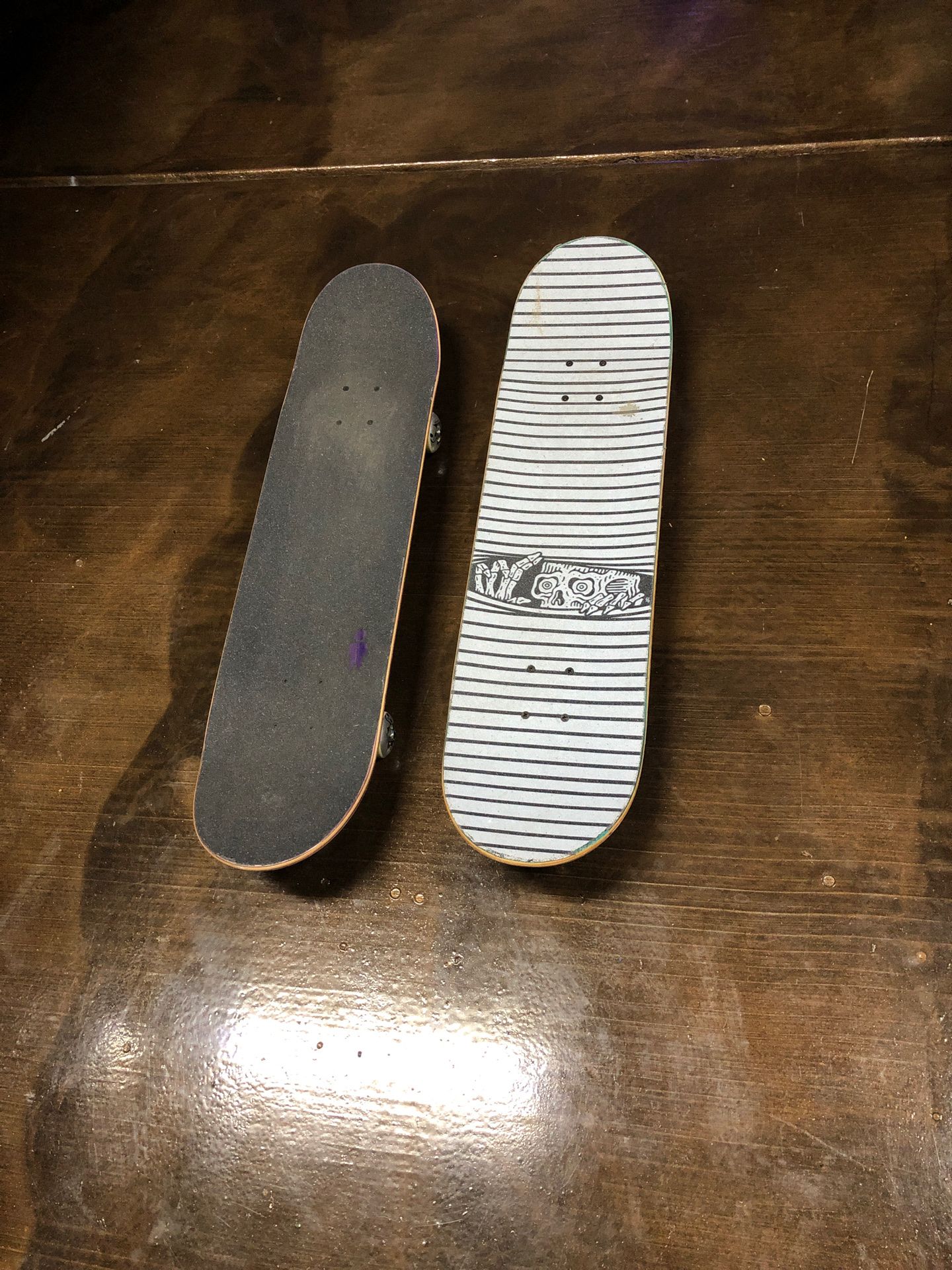 Skateboards one is custom the other is from Alien Workshop sold together as seen price