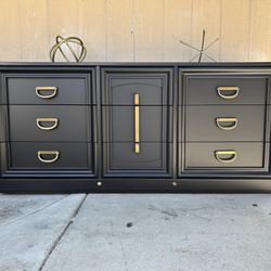 Beautiful Mid century black & gold dresser or console 