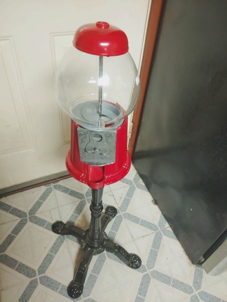 Buble Gum Machine On A Stand In Good.
Condition
