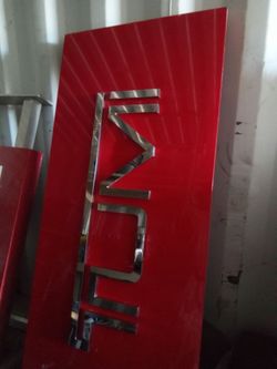 TUMI Store sign