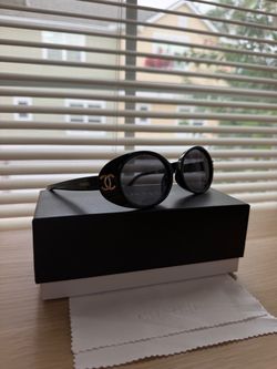 Chanel Round Black Sunglasses with Gold CC Logo