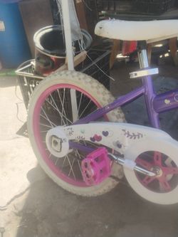 huffy purple sea star with pink rims 20 in