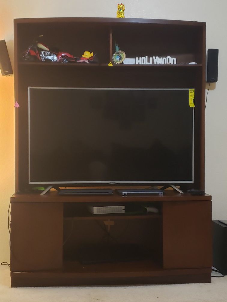 TV stand holds upto 55 inch tv
