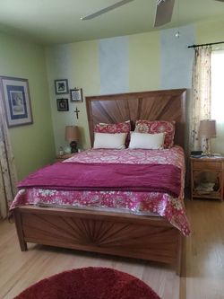 Queen headboard with adjustable rolling frame.