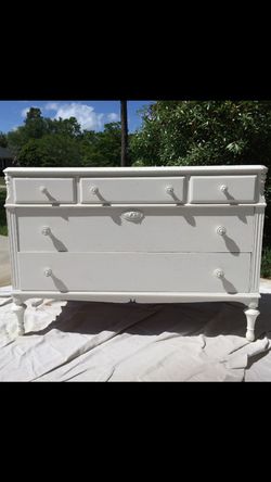 Antique five drawer dresser painted in white chalk paint. Drawers work really well.