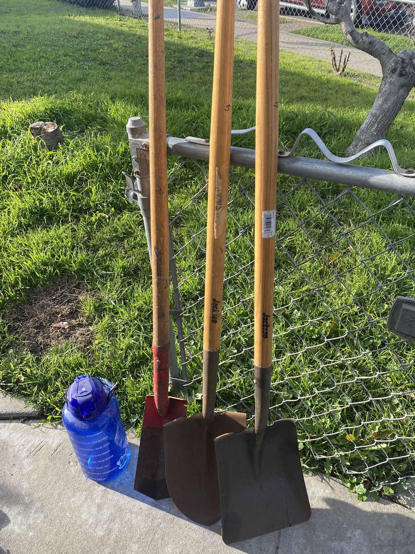 3 shovels, big water jug. $10 for all