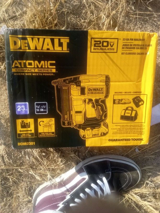 Dewalt Atomic Series Nail Gun With Battery, Charger, And A Tool bag And Bekt