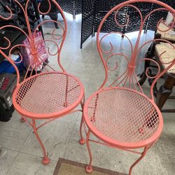 Three vintage coral ice cream parlor chairs 