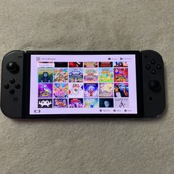 NINTENDO SWITCH OLED + 512GB SD with 125 POPULAR SWITCH GAMES