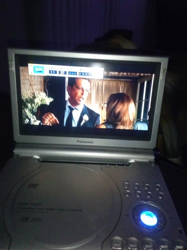 Portable DVD Player With Extra Audio/Video Input For A Game System To Be Hooked Into The DVD Screen Or Be Used To Connect Another TV Screen Or Speaker