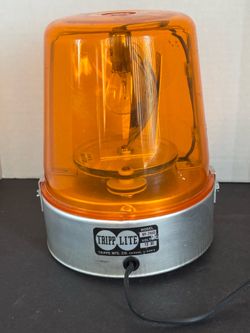 VINTAGE TRIPP LITE AMBER LIGHT