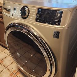  Electric G E Washer ..  The Start Button  Its Stuck  . We Getting  A New One.. Maybe It's A Ez Fix  Idk..  Make Me An Offer
