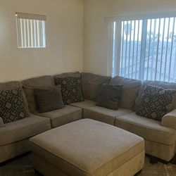 Gray Sectional With Ottoman
