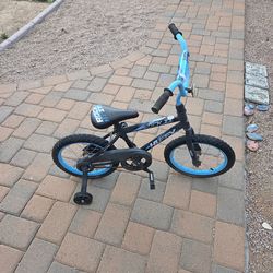 Child's bike with training wheels