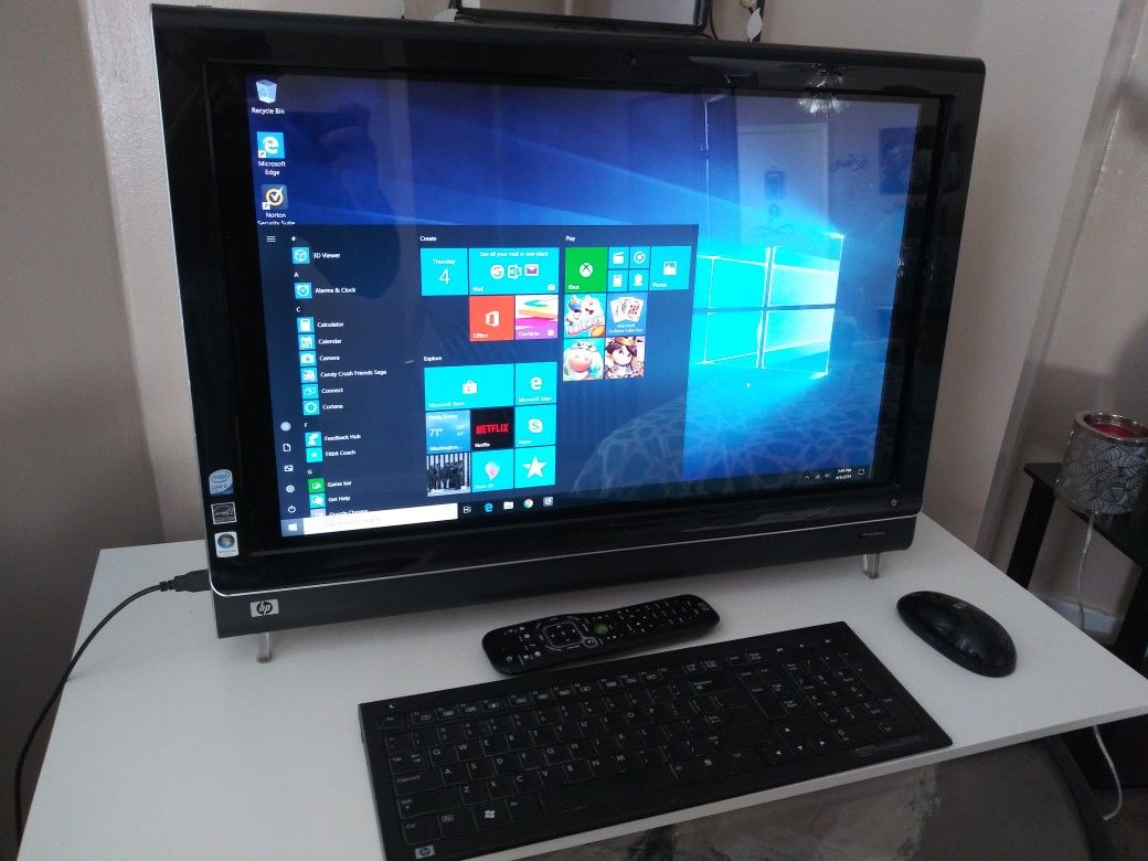 HP TouchSmart touchscreen computer 25.5 inch screen wireless keyboard wireless mouse and remote this computer is like new model number iq804