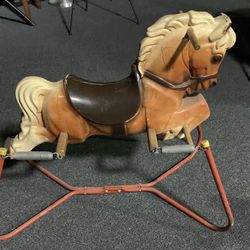 Vintage rocking horse for toddlers - $25 Horse has some writing on it but in very good condition given its age