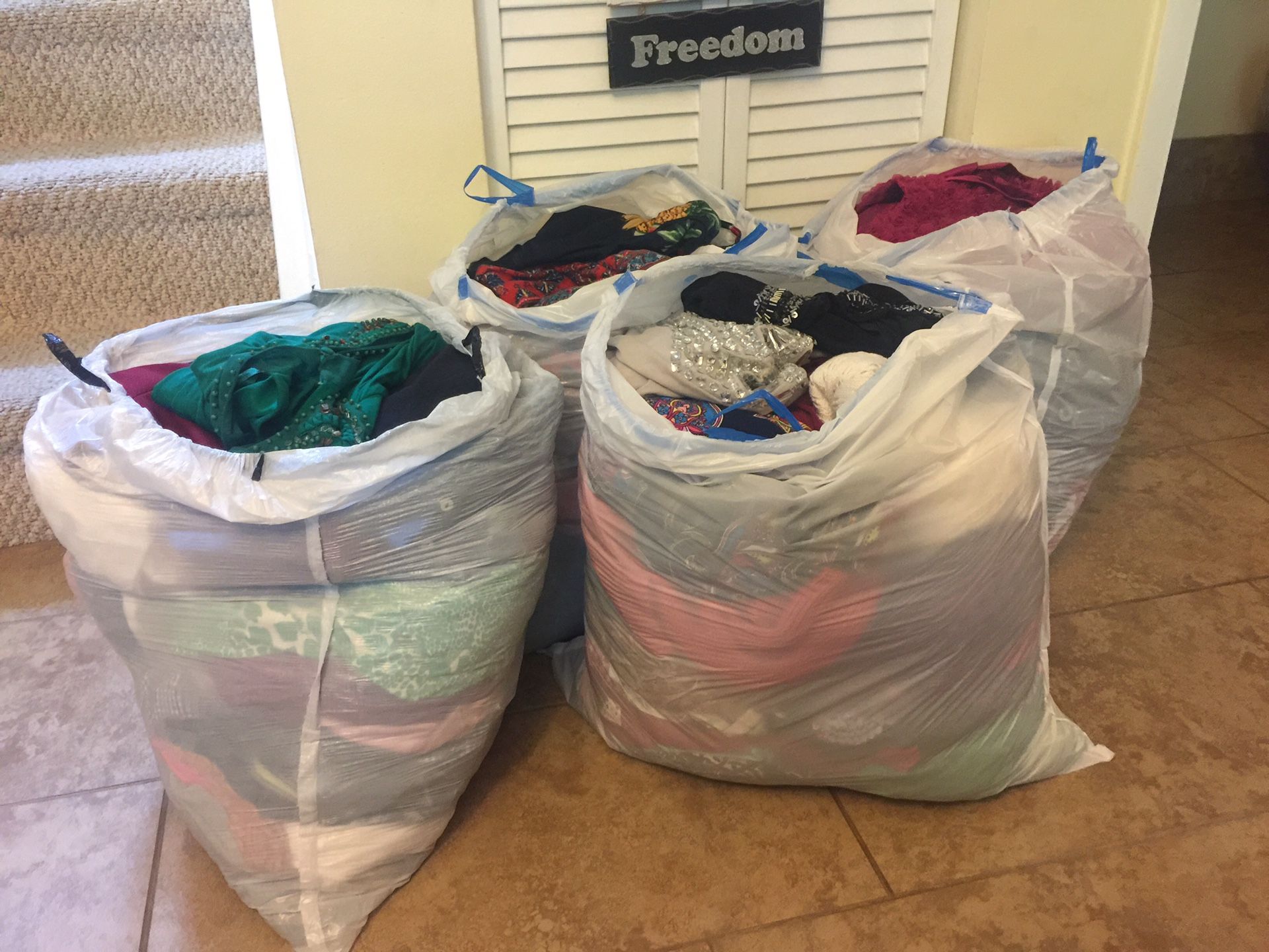 4 bags of clothes for $80