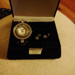 White Diamonds Watch And Earrings By Elizabeth Taylor