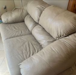 Leather tan love seat $50