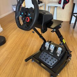 Logitech G29 racing setup with foldable stand