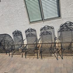 $350 IRON 4 ROCKING CHAIRS AND BIG OVAL TABLE 