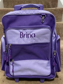 Purple rolling bag