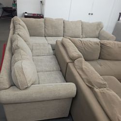 Beige large l-shaped couch