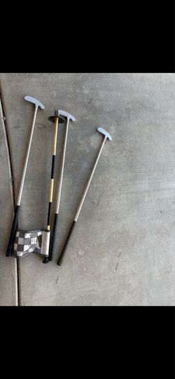 Golfing clubs for kids and putty