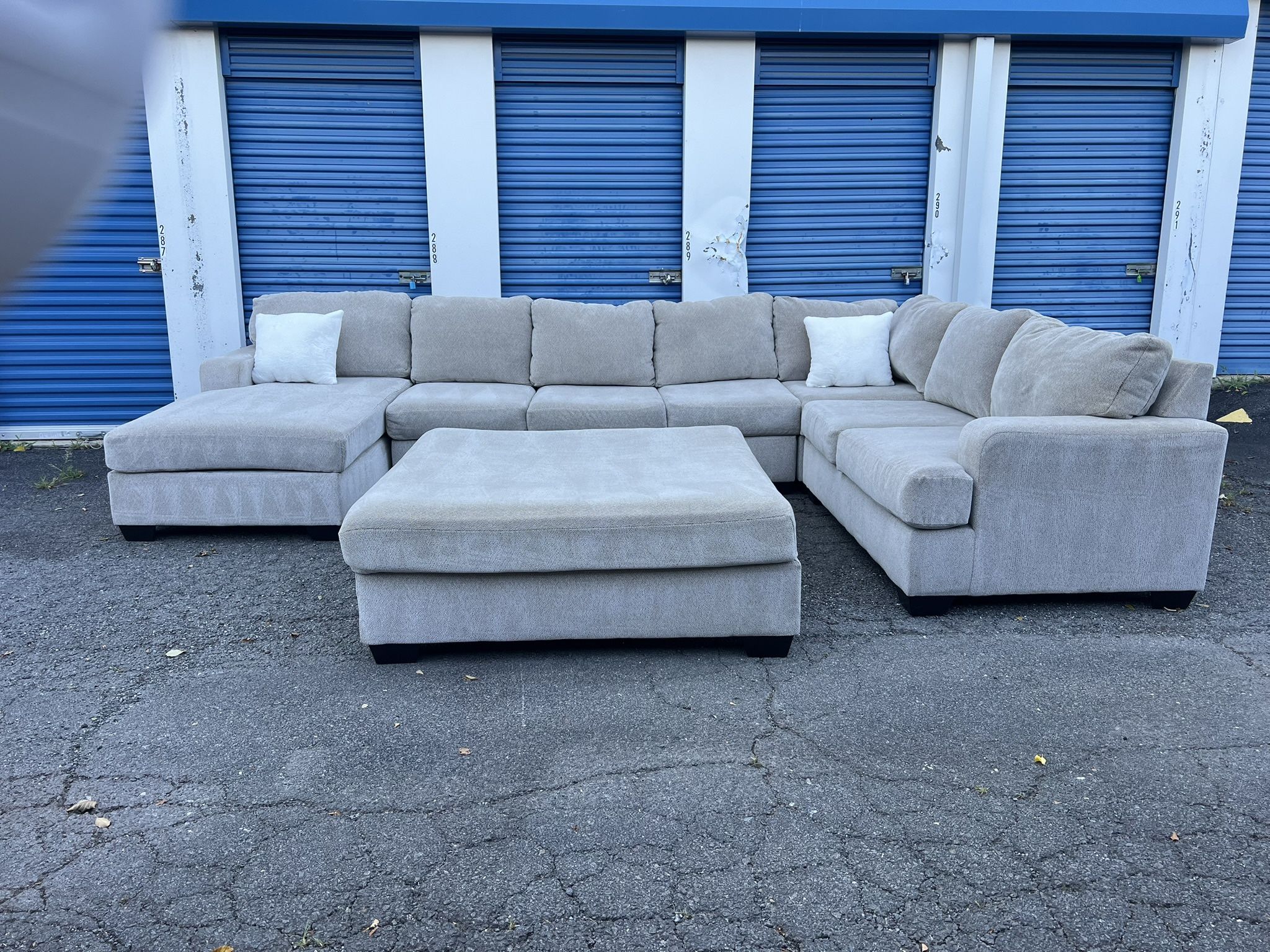 Beige sectional with oversized ottoman DELIVERY AVAILABLE!*