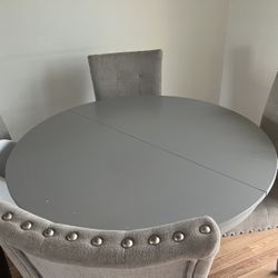 chairs and adjustable dining table