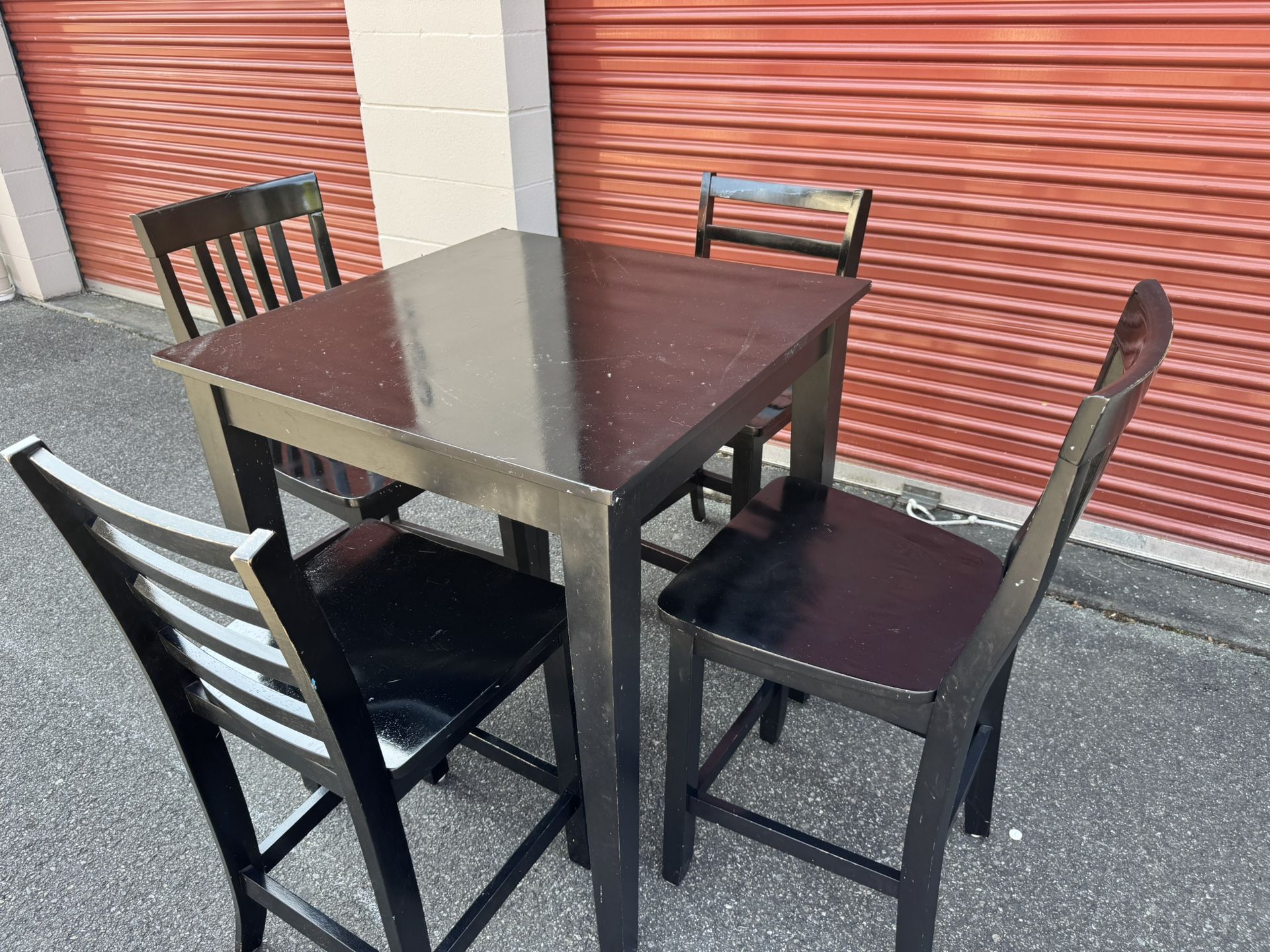 Wooden high table and four chairs