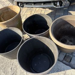 FIVE (5) LARGE OVERSIZED FLOWER OR TREE POTS WITH DRAIN HOLES.  3 Identical Black Planters & 2 Other Styles.  ALL 5 NOW ONLY $50 FIRM.  