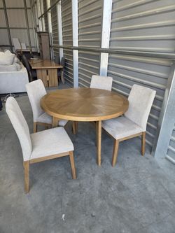 Pike & Main
Brooklyn 48" Round Dining Table and 4 Chairs

Constructed of Rubberwood Solids and Ash Veneers
Reverse Diamond Veneer Pattern
Chairs Uphol