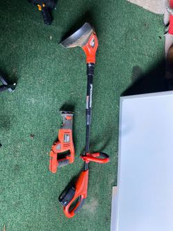 Black and decker Grasshog and sawsall - one battery needs charger.