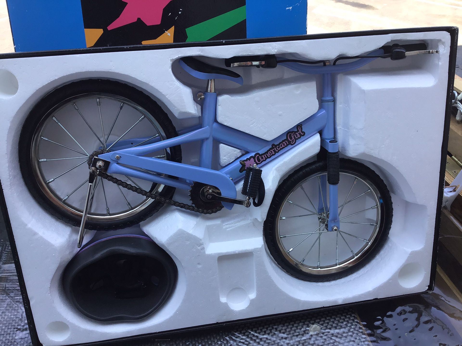 American Doll bicycle and helmet
