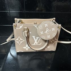 Louis Vatton OnTheGo PM tote 