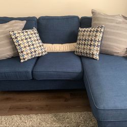 Navy blue couch with moveable chase
