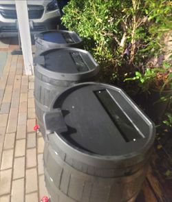 50-GALLON FLAT BACK RAIN BARREL WITH SPIGOT. 1 LEFT ONLY.