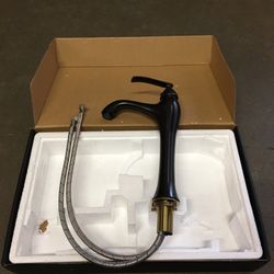 New in Box $25 oil rubbed bronze color single handle bathroom vessel faucet 