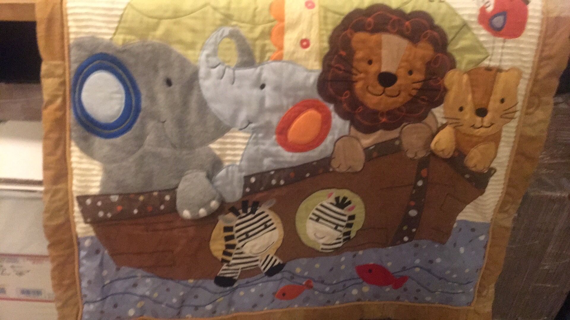 45”x35” Two Sided 3-D Baby Blanket in excellent condition Multicolored w/ Elephants, Lions, Monkeys, Birds, Zebras and Fish all gathered together to c