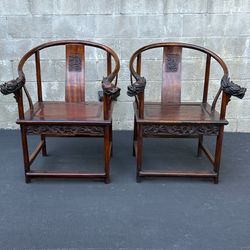 Pair of Antique Chinese Horseshoe-Back Armchairs with Dragon Carvings 