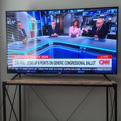 55 inch Roku Smart HDTV Onn w/TV Stand