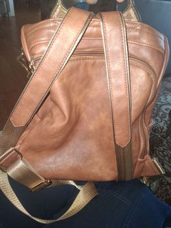 Brown Leather Backpack with Gold Hardware